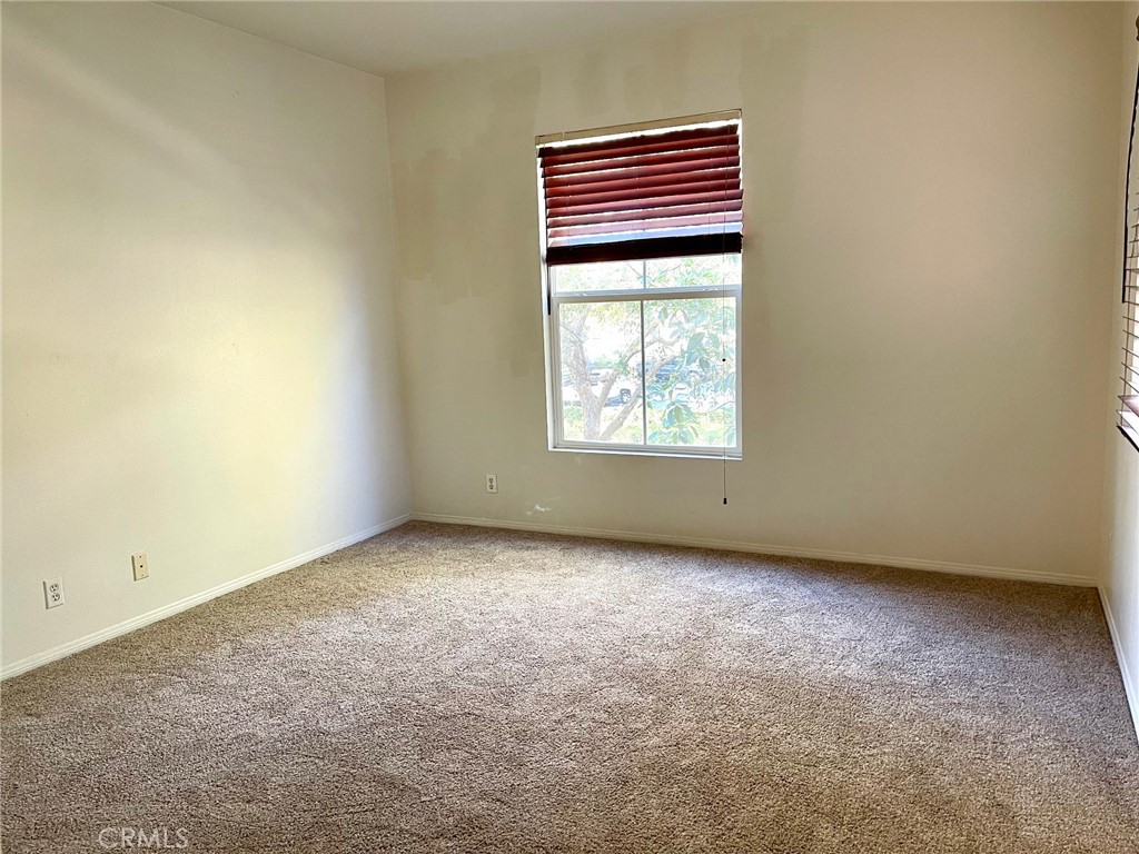 312 Quail Ridge Irvine, CA 92603 - Photo 10 of 35 an empty room with a window
