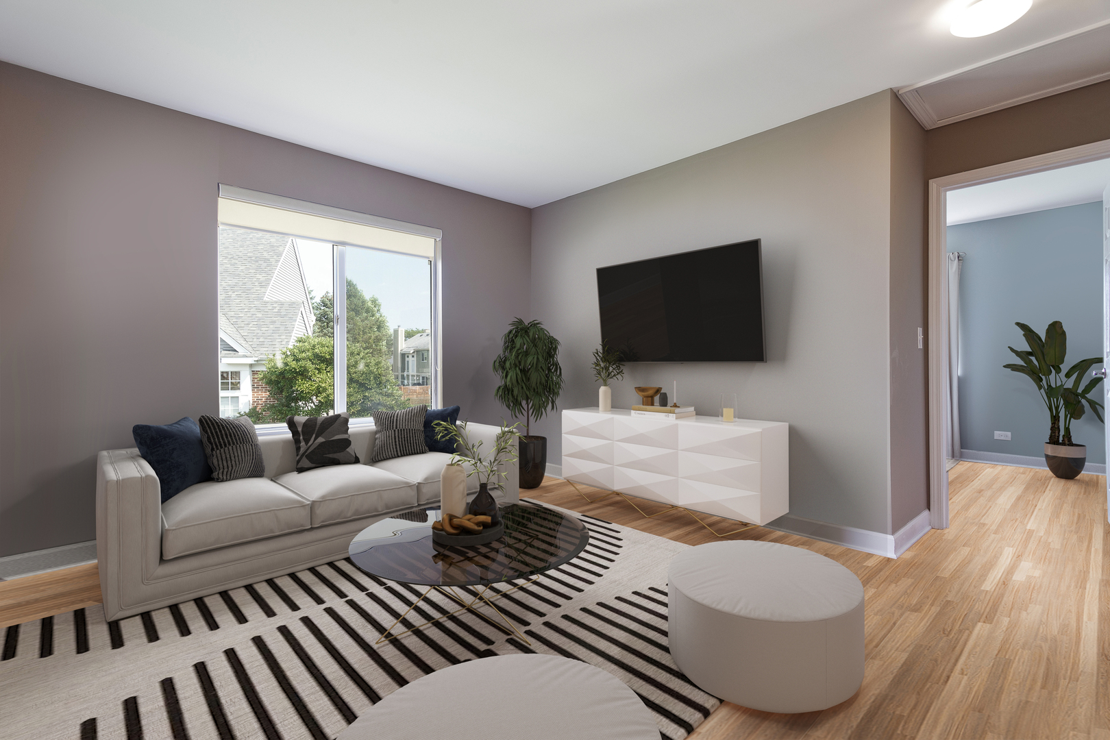 438 Harvard Lane Bartlett, IL 60103 - Photo 12 of 26 a living room with furniture and a flat screen tv