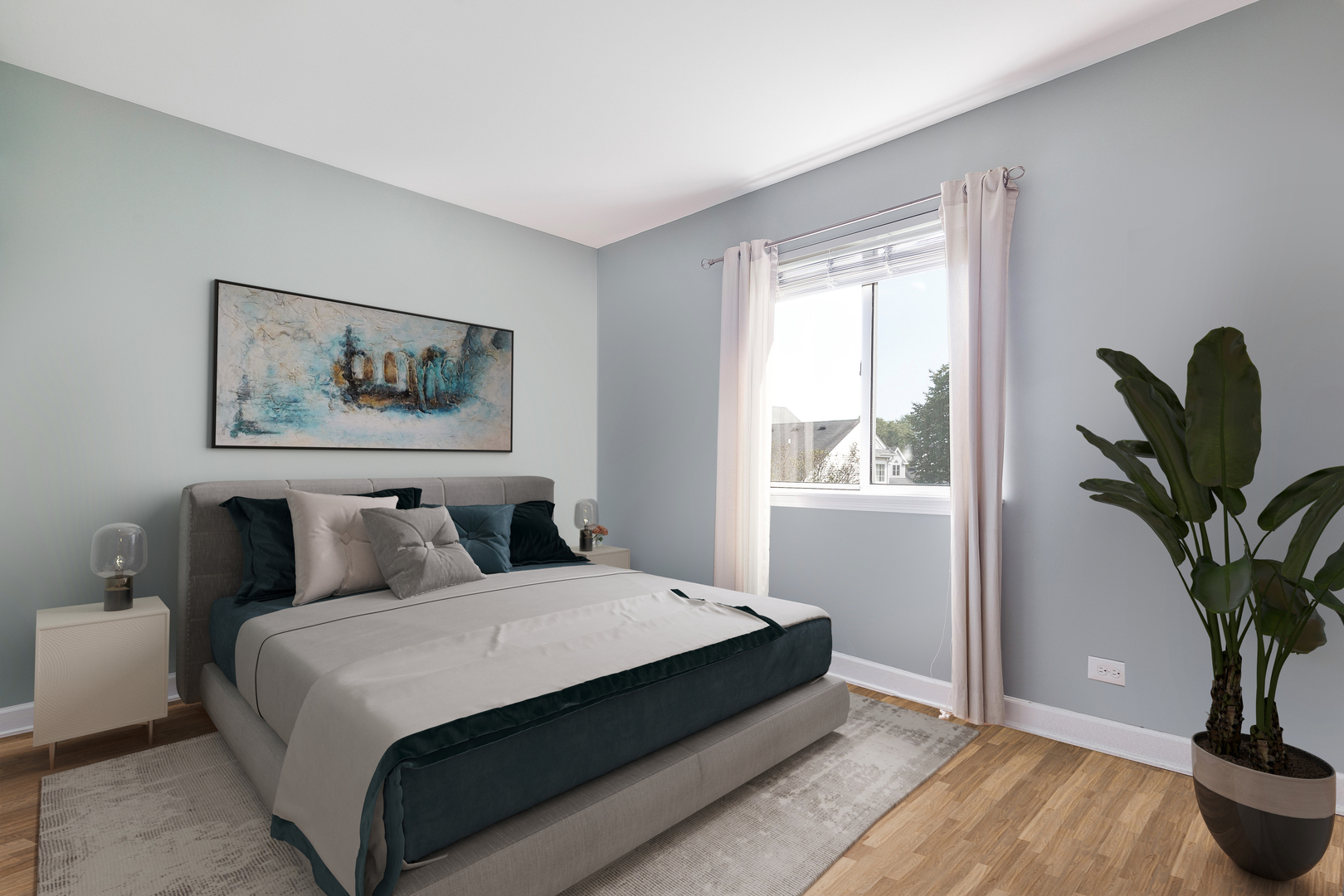 438 Harvard Lane Bartlett, IL 60103 - Photo 15 of 26 a bedroom with a large bed and a potted plant