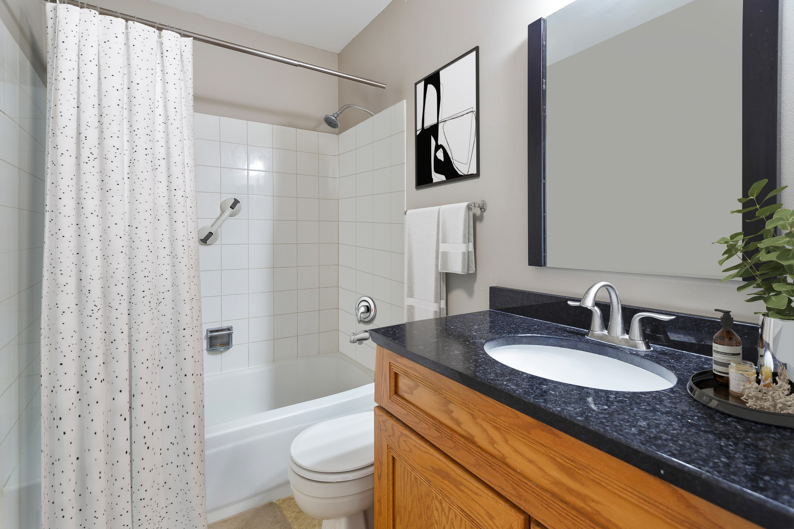438 Harvard Lane Bartlett, IL 60103 - Photo 16 of 26 a bathroom with a granite countertop sink toilet and shower