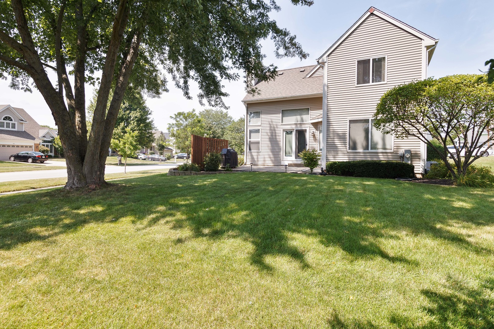 438 Harvard Lane Bartlett, IL 60103 - Photo 20 of 26 a view of a yard in front of house