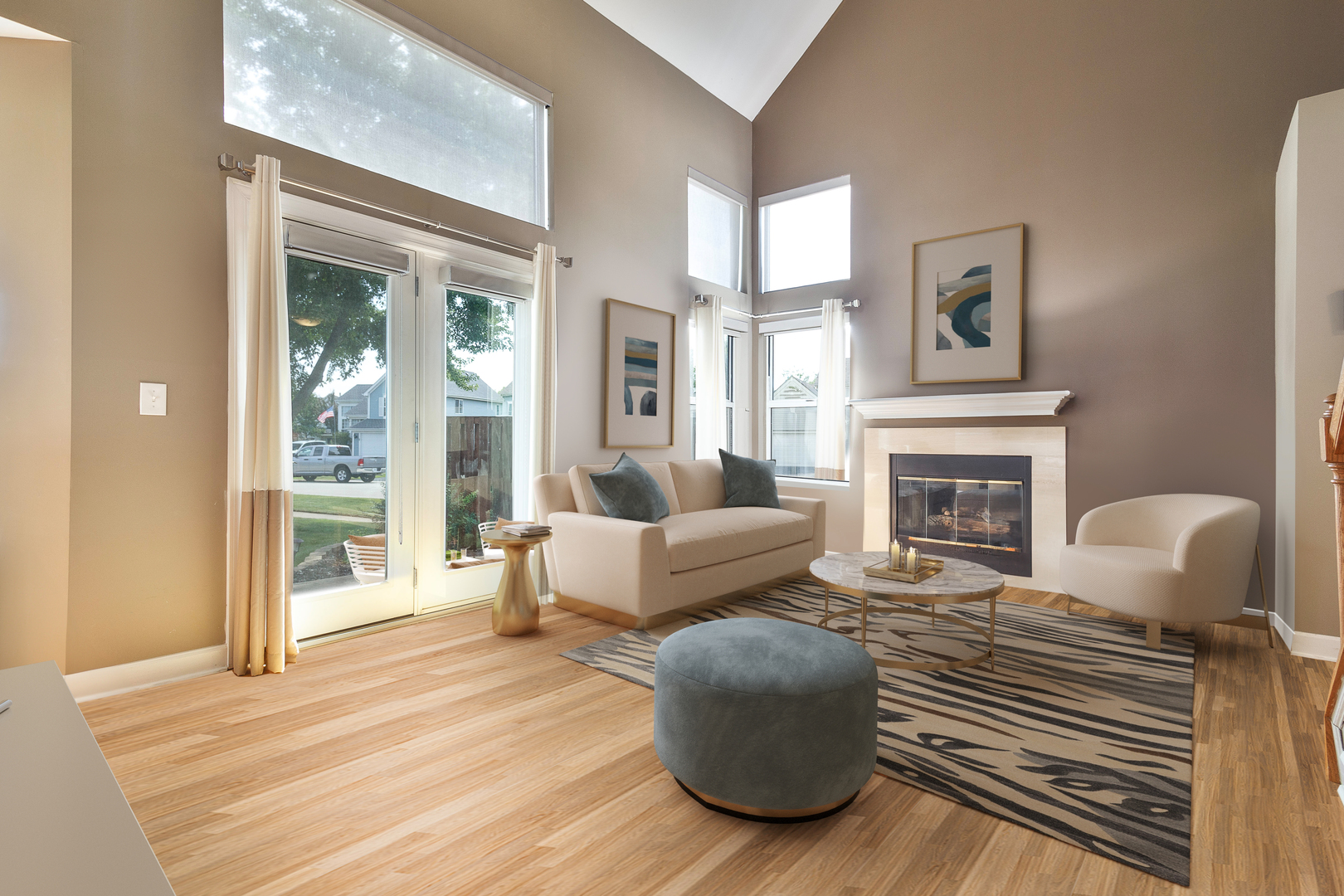 438 Harvard Lane Bartlett, IL 60103 - Photo 4 of 26 a living room with furniture and a fireplace