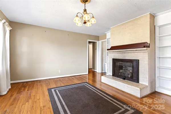 a living room with a fireplace