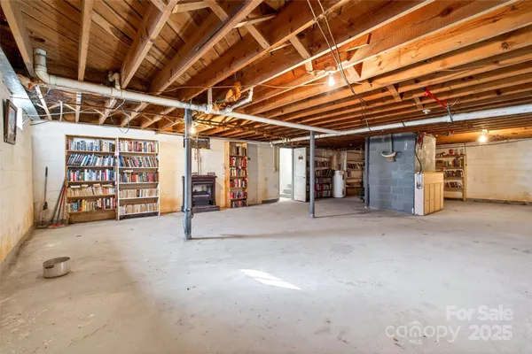 a view of an empty room with storage