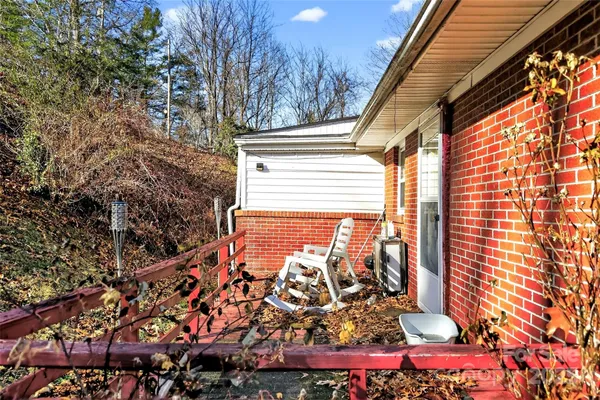 a view of a balcony with next to a road