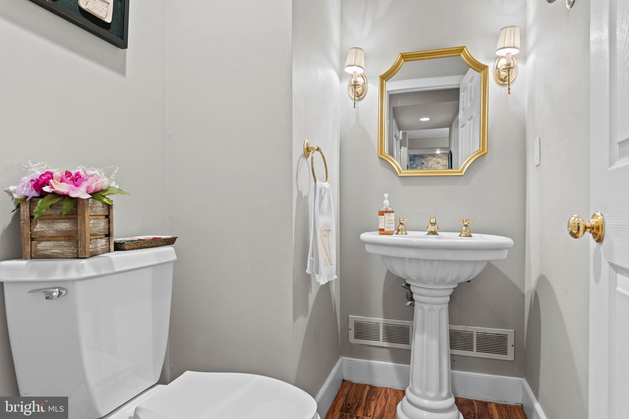 24 Greythorne Woods Circle Wayne, PA 19087 - Photo 15 of 29 a bathroom with a sink mirror and toilet