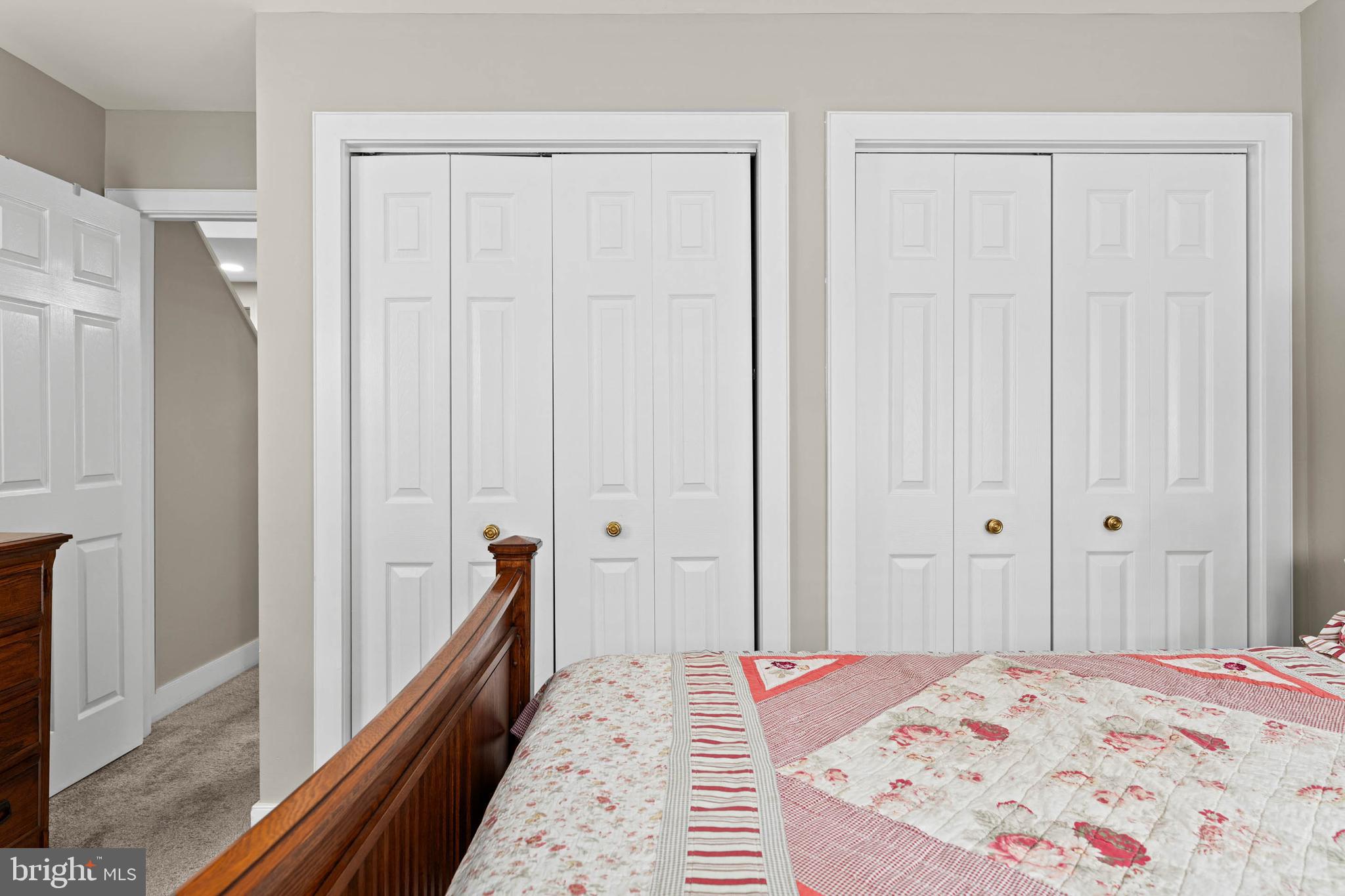 24 Greythorne Woods Circle Wayne, PA 19087 - Photo 17 of 29 a bedroom with bed and wooden floor