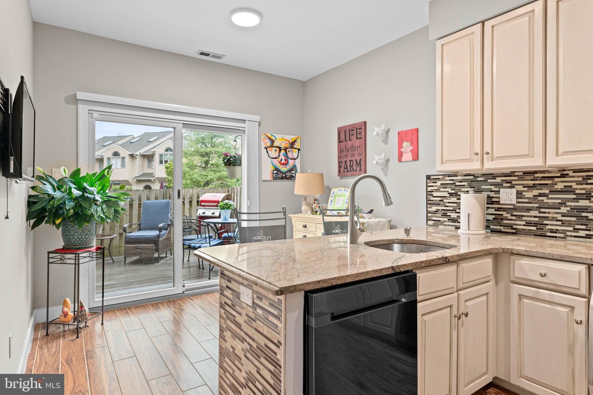 24 Greythorne Woods Circle Wayne, PA 19087 - Photo 8 of 29 a kitchen with a sink appliances cabinets and dining table