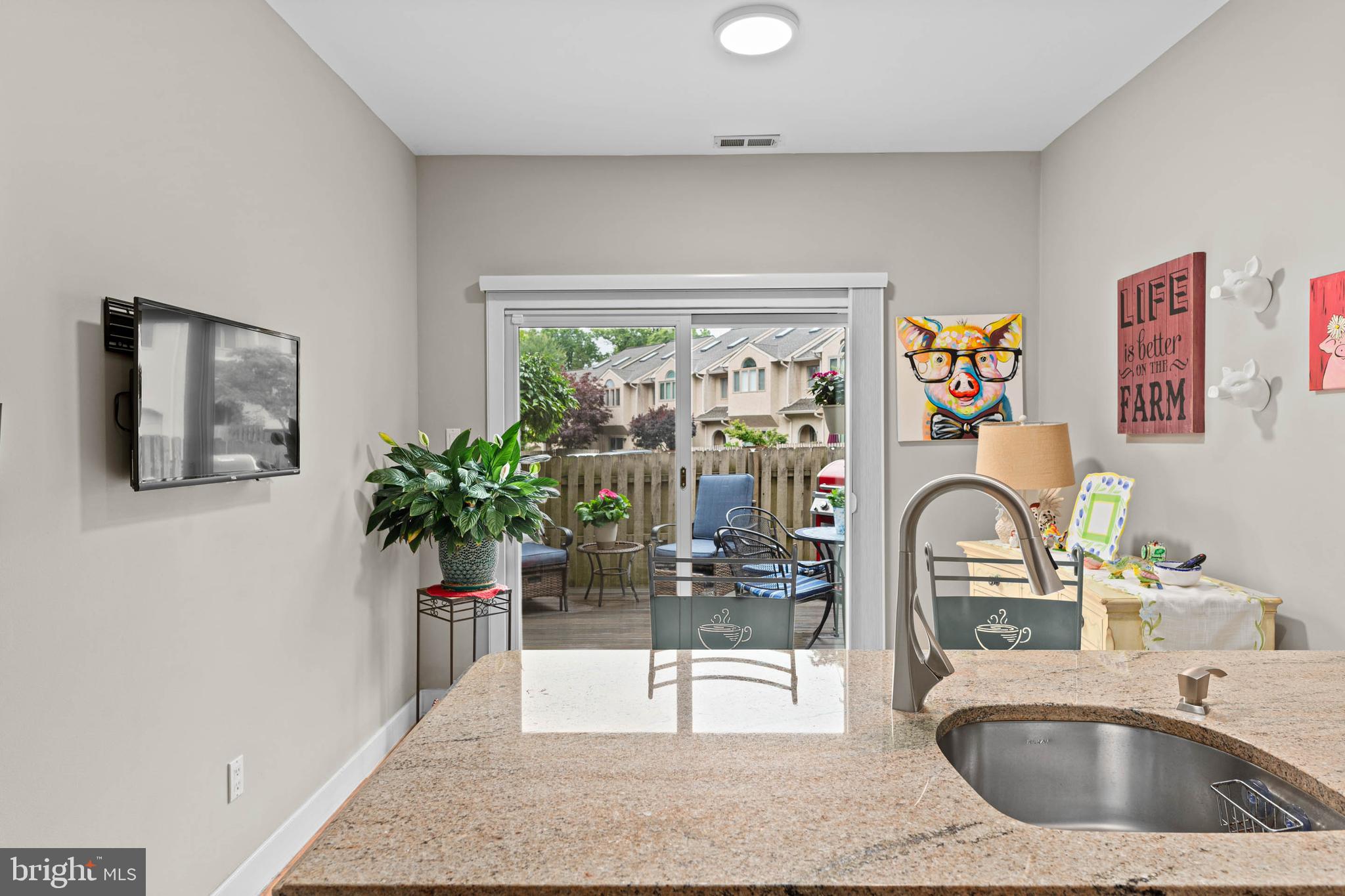 24 Greythorne Woods Circle Wayne, PA 19087 - Photo 9 of 29 a kitchen with a refrigerator and sink