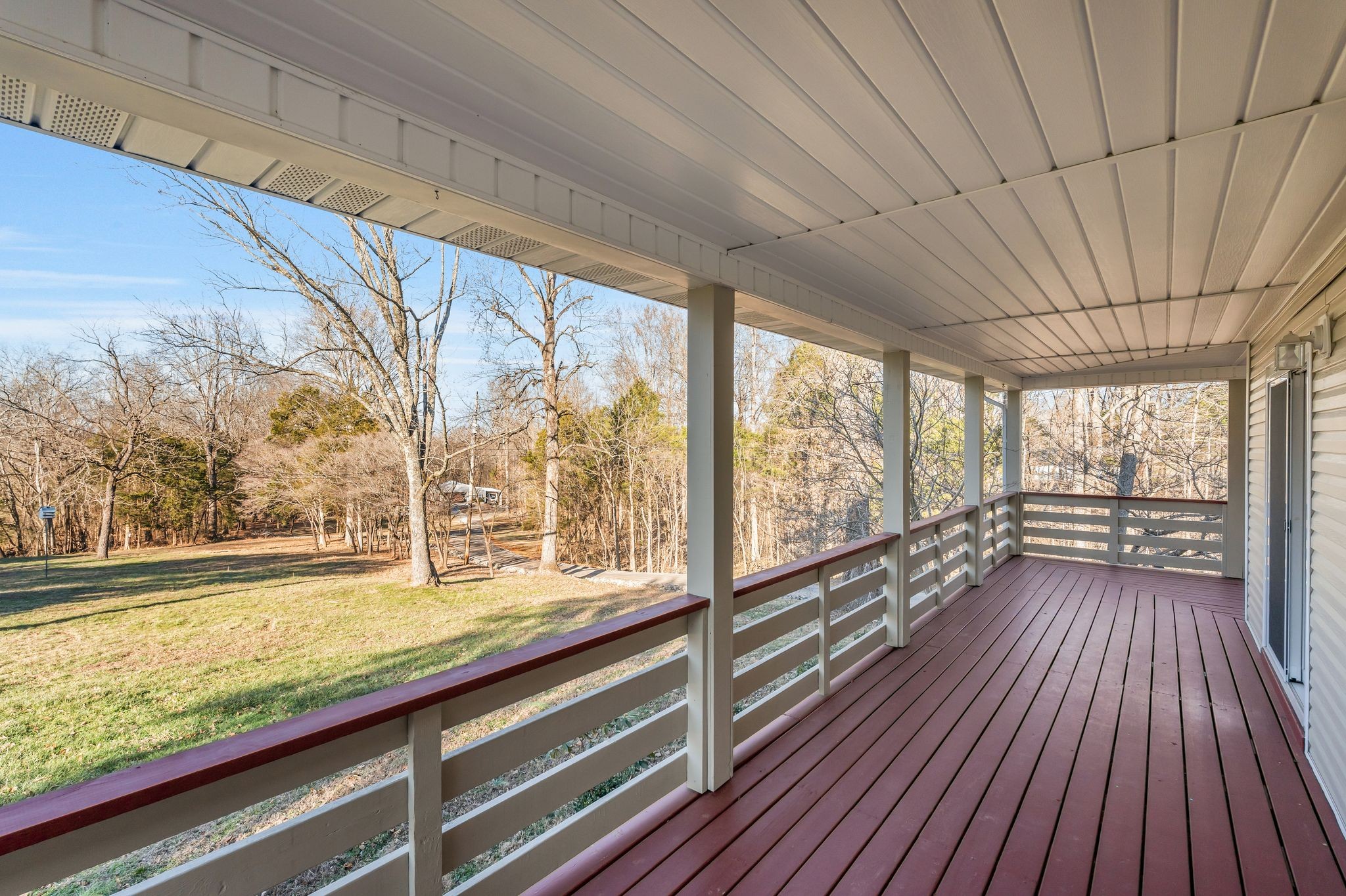 739 Salem Ridge Road Clarksville, TN 37040 - Photo 17 of 22 a view of a room with wooden floor and iron stairs