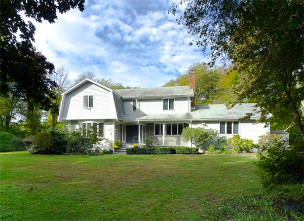 9 Heard Road Wayland, MA 01778 - Photo 1 of 25 a front view of a house with garden