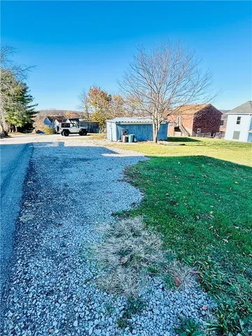 a house view with a garden space