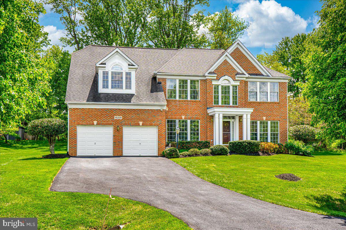 15205 Lions Den Road Burtonsville, MD 20866 - Photo 1 of 31 a front view of a house with a yard