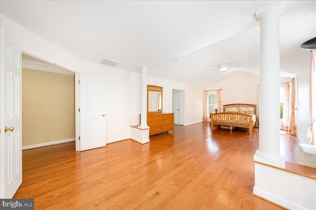 15205 Lions Den Road Burtonsville, MD 20866 - Photo 15 of 31 a living room with furniture and a table