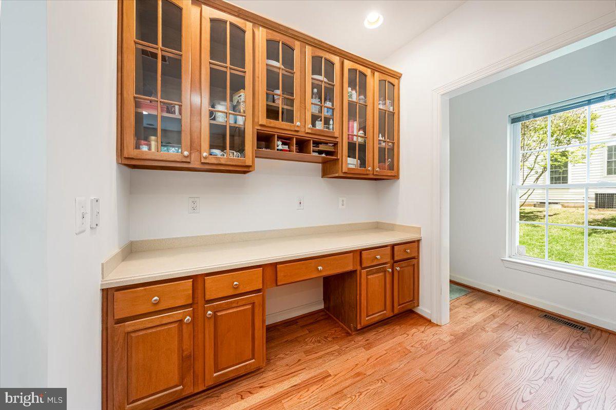 15205 Lions Den Road Burtonsville, MD 20866 - Photo 18 of 31 a view of a kitchen with stainless steel appliances granite countertop a stove a sink and a window