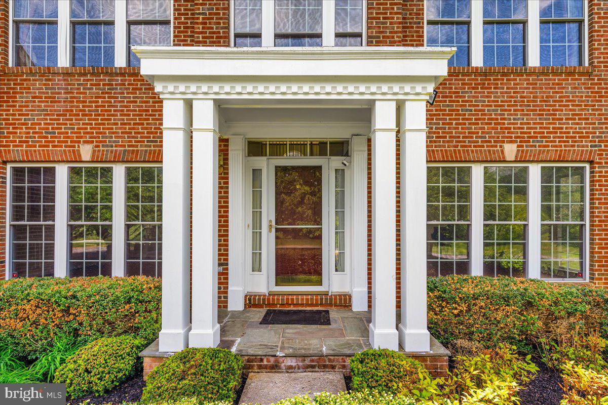 15205 Lions Den Road Burtonsville, MD 20866 - Photo 2 of 31 front view of a brick building