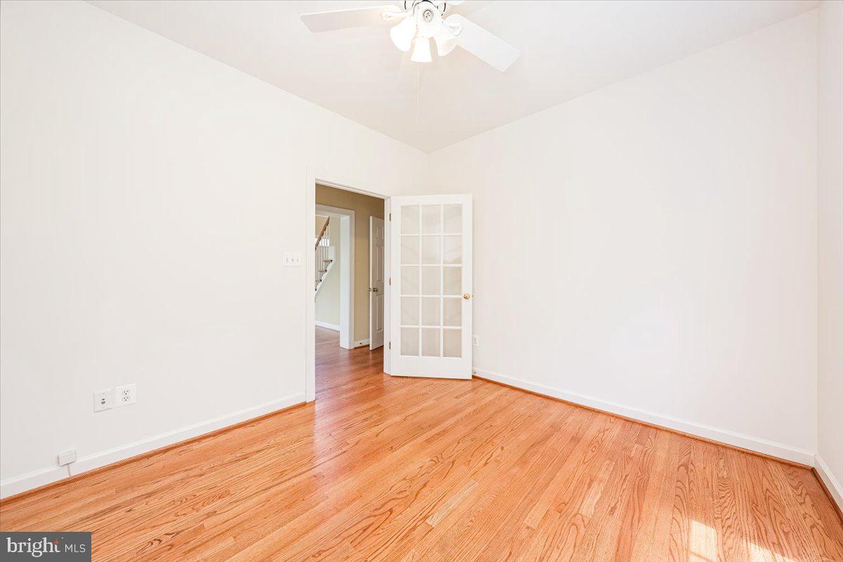 15205 Lions Den Road Burtonsville, MD 20866 - Photo 22 of 31 a view of an empty room with a window