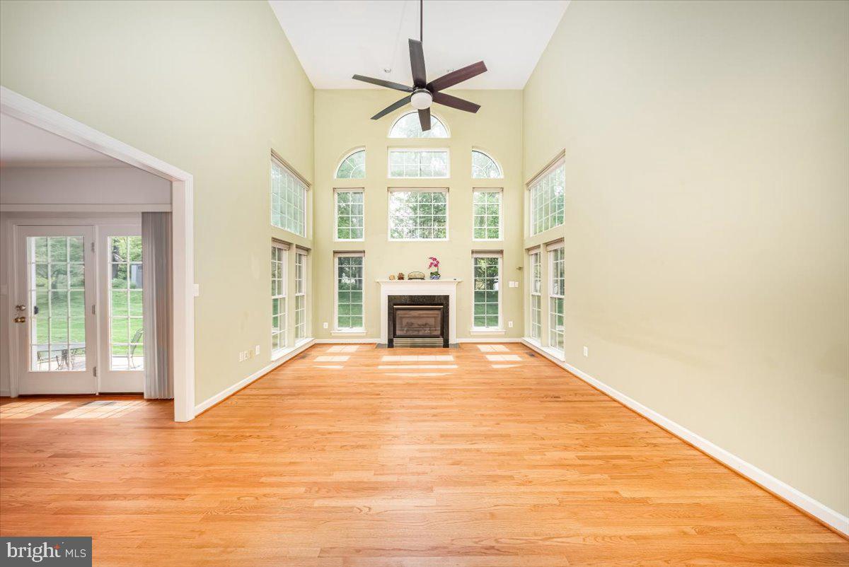 15205 Lions Den Road Burtonsville, MD 20866 - Photo 7 of 31 a view of an empty room with a window