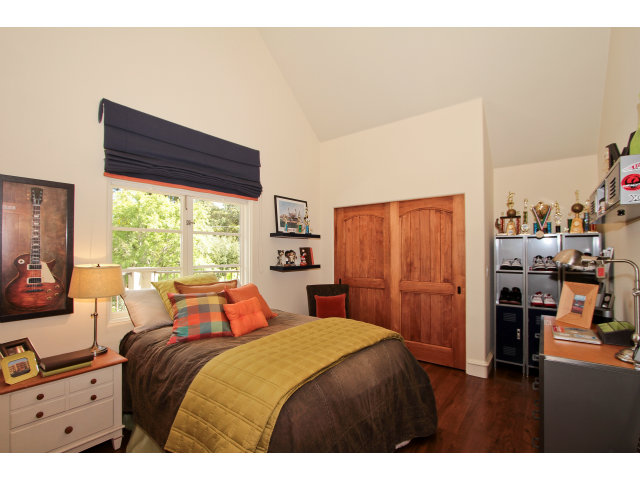 49 Lowery Drive Atherton, CA 94027 - Photo 17 of 25 a bedroom with a bed and a large window