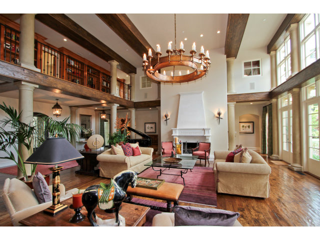 49 Lowery Drive Atherton, CA 94027 - Photo 5 of 25 a living room with fireplace furniture and a chandelier