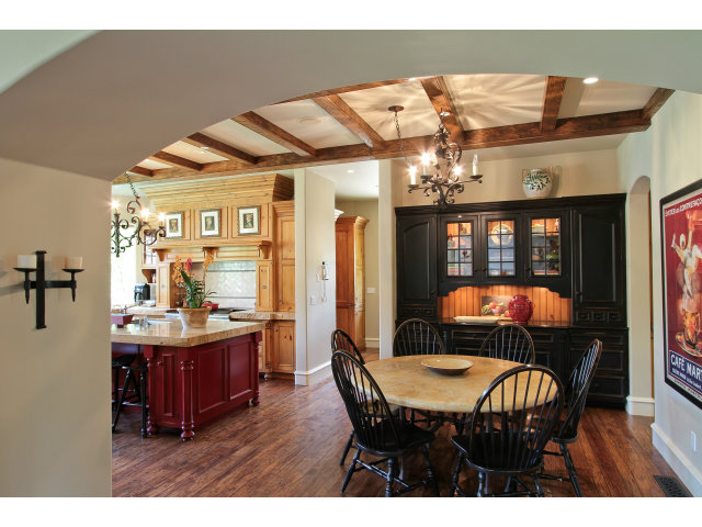 49 Lowery Drive Atherton, CA 94027 - Photo 10 of 25 a dining room with furniture a chandelier and wooden floor