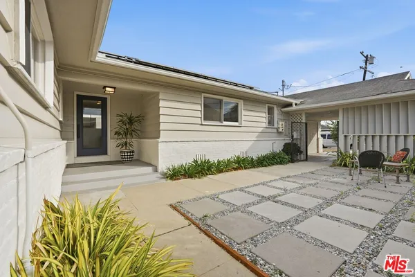 a view of a house with a patio