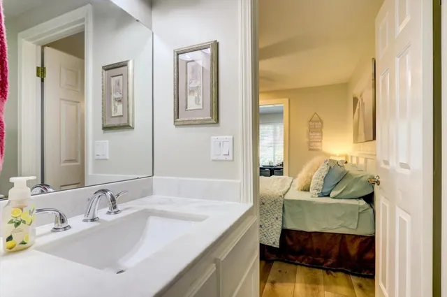 a view of a patio with table and chairs and potted plants