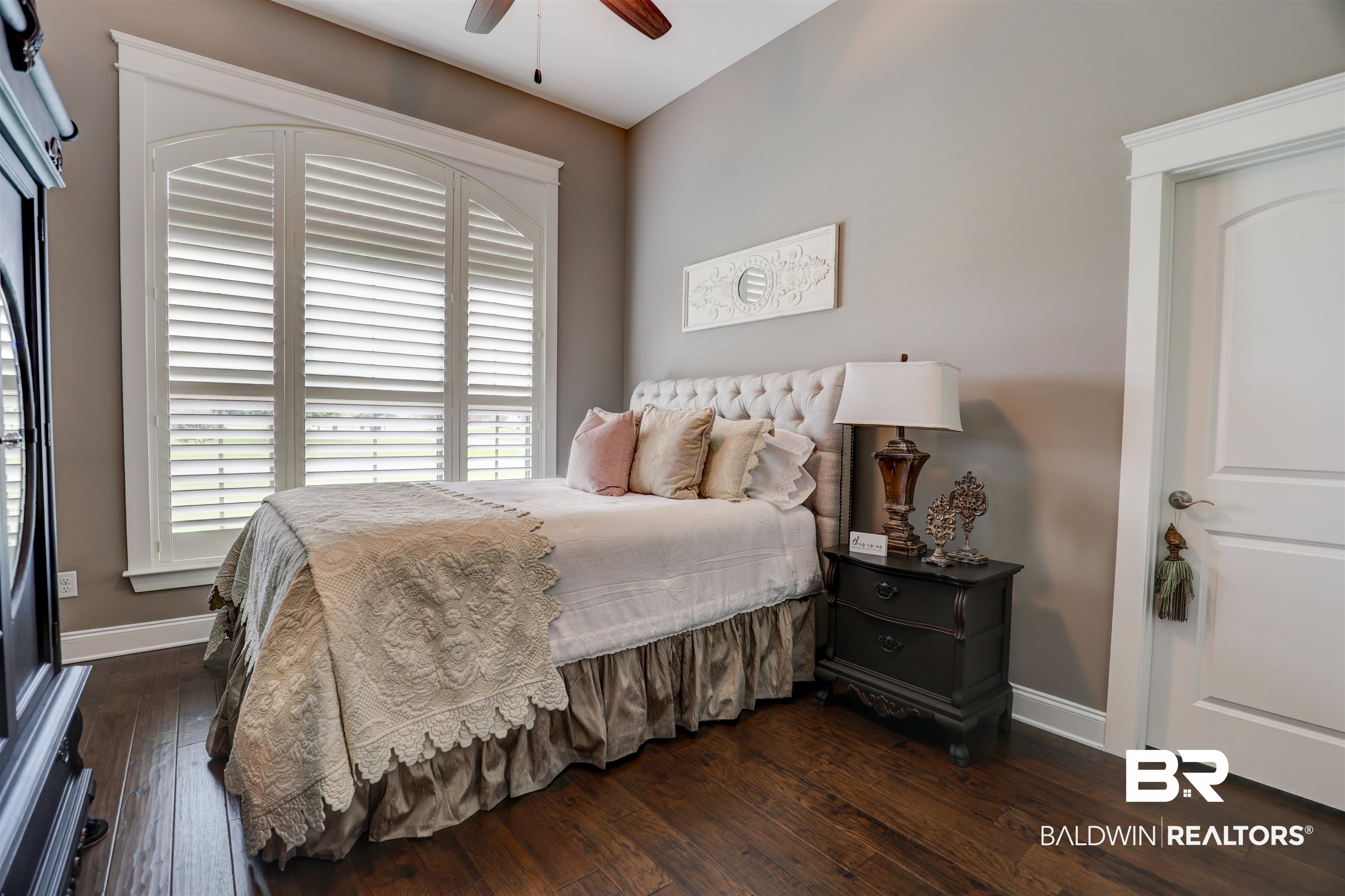 10588 Leesburg Pike Daphne, AL 36526 - Photo 21 of 29 Bedroom featuring dark wood-type flooring and ceiling fan