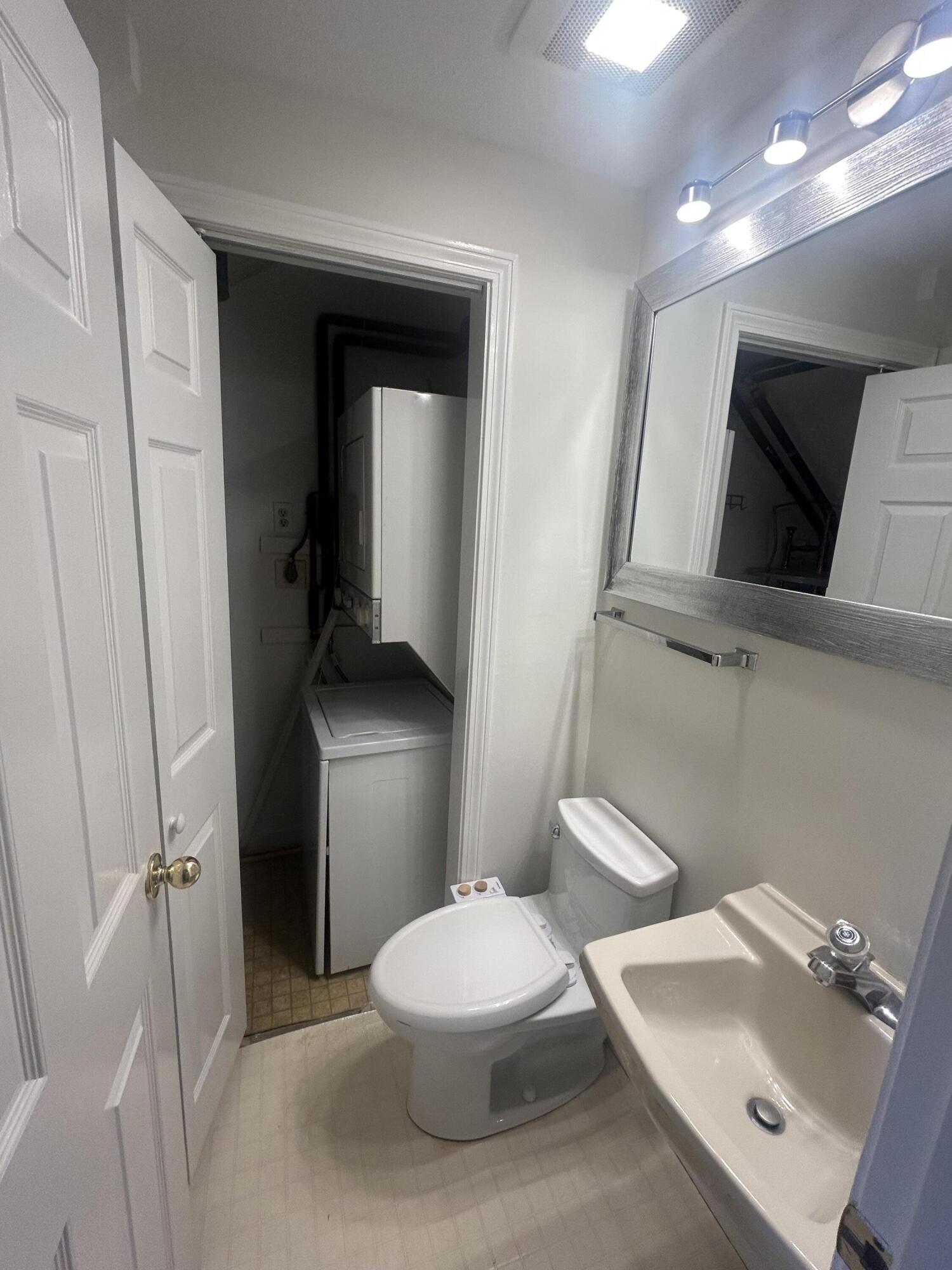 135 West Main Street, Unit 41 Hyannis, MA 02601 - Photo 4 of 9 a white toilet sitting next to a bathroom sink