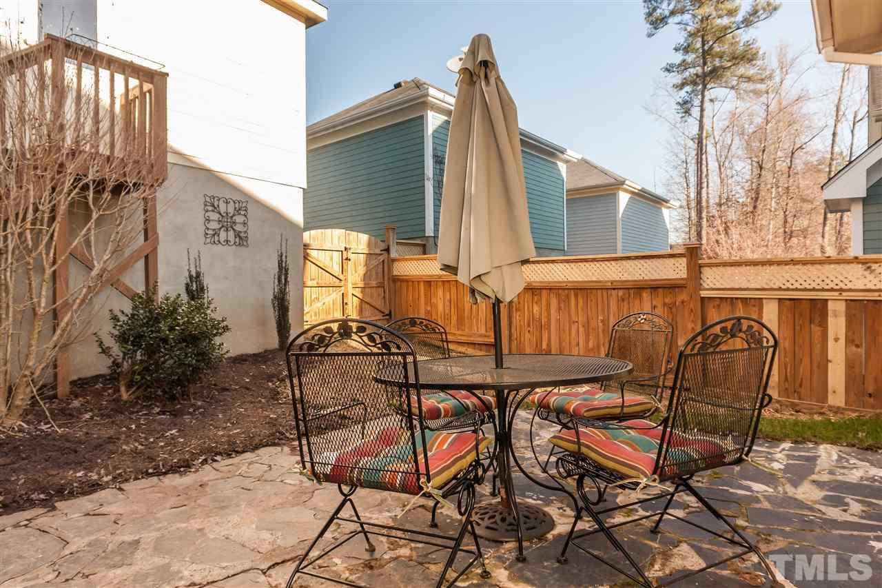 2224 Dunlin Lane Raleigh, NC 27614 - Photo 21 of 23 a view of a chairs and table in the balcony