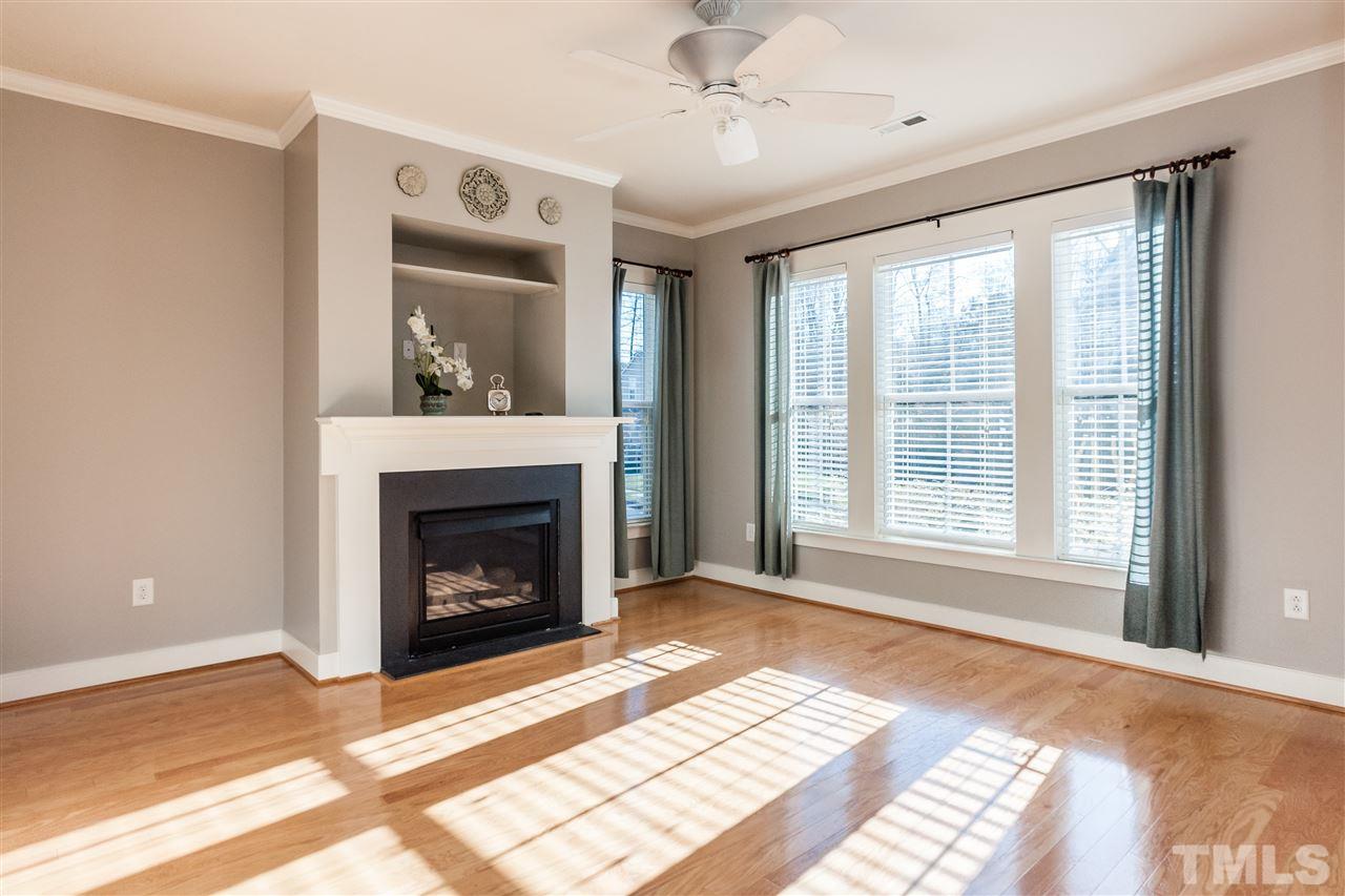 2224 Dunlin Lane Raleigh, NC 27614 - Photo 6 of 23 a view of an empty room with window and fire place