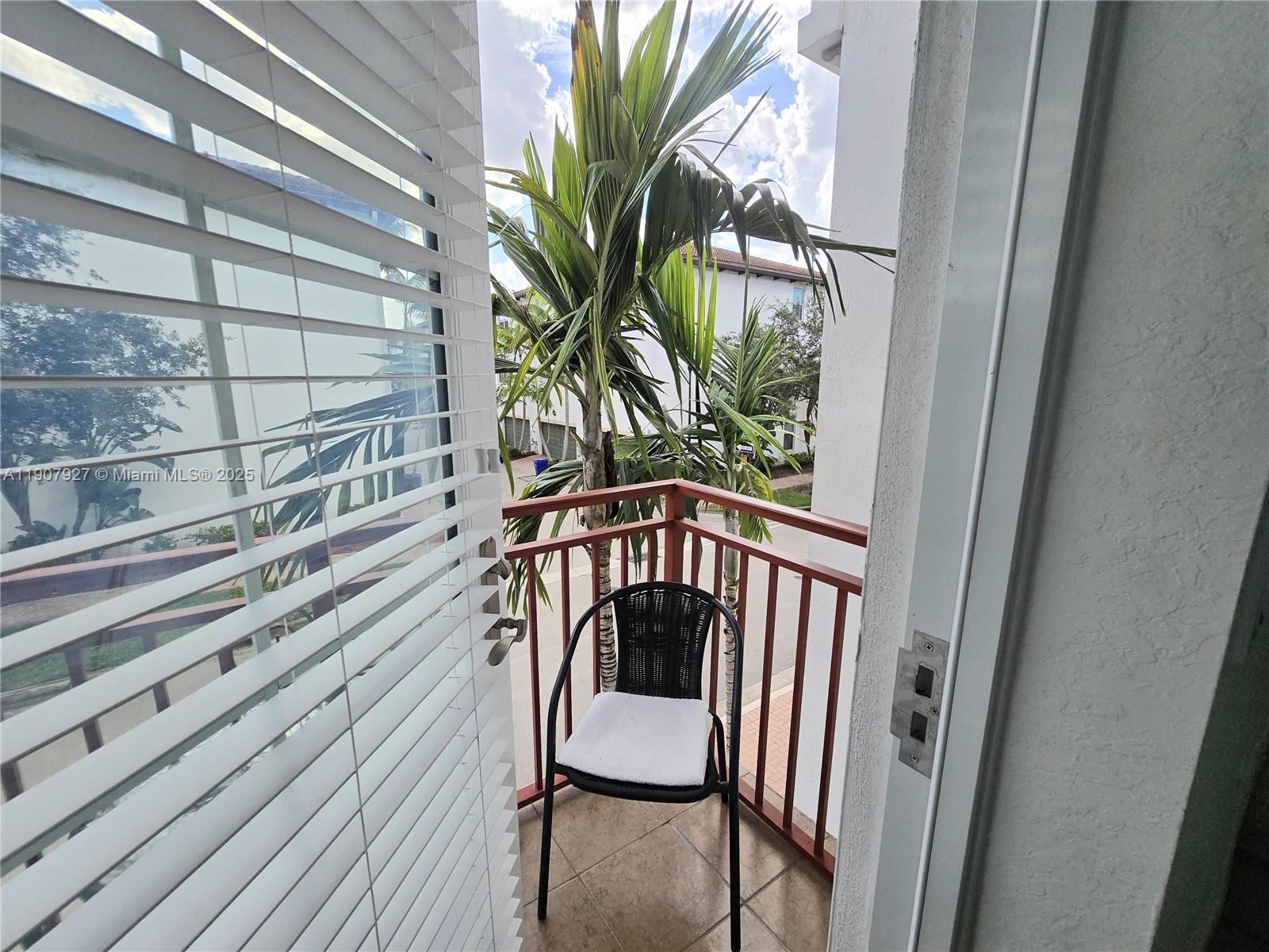 11938 Southwest 26th Court Miramar, FL 33025 - Photo 29 of 61 a view of a balcony with furniture