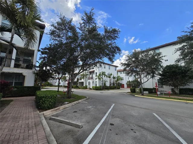 a view of a swimming pool with a lounge chairs