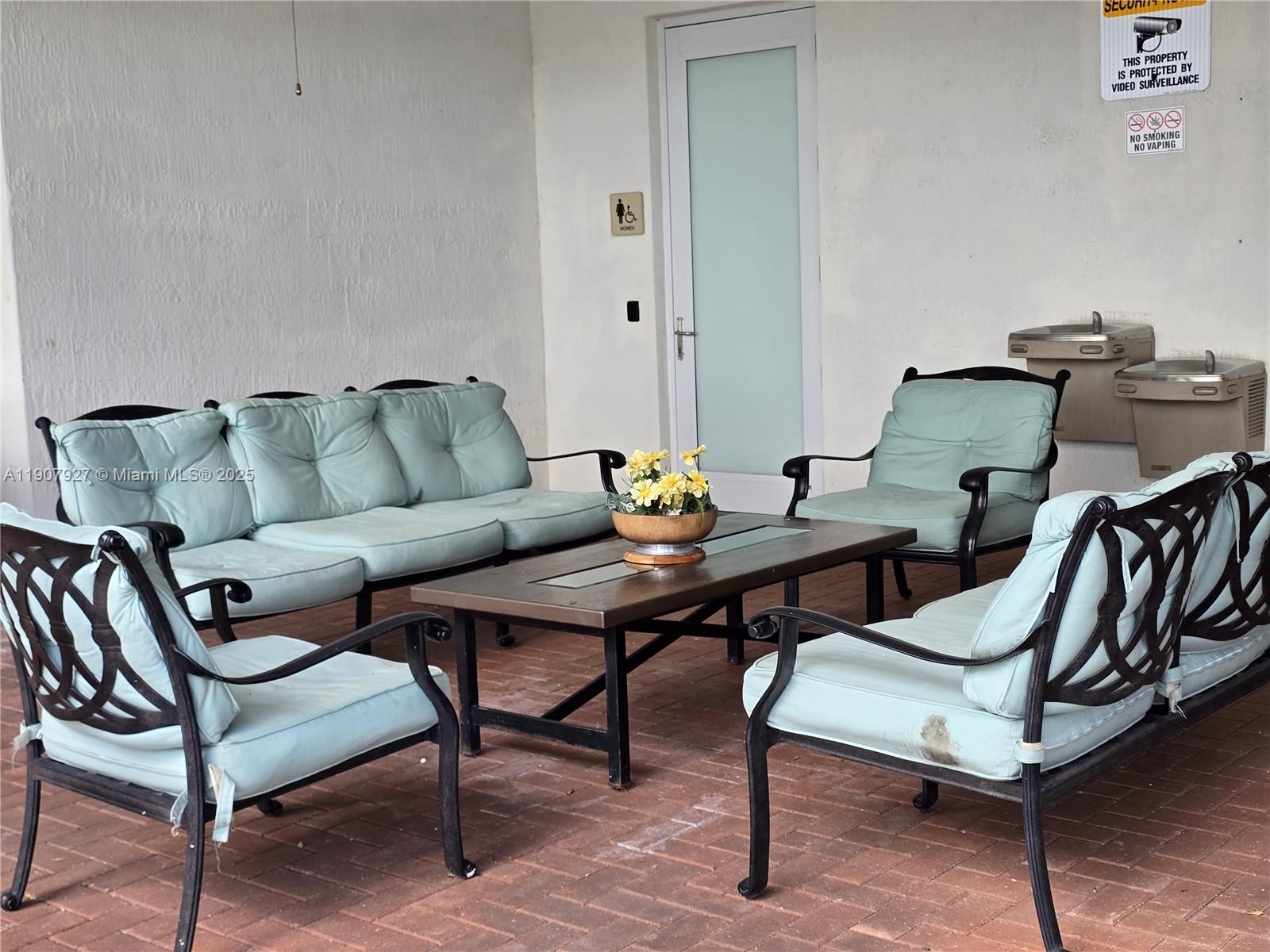 11938 Southwest 26th Court Miramar, FL 33025 - Photo 53 of 61 a living room with furniture and a wooden floor