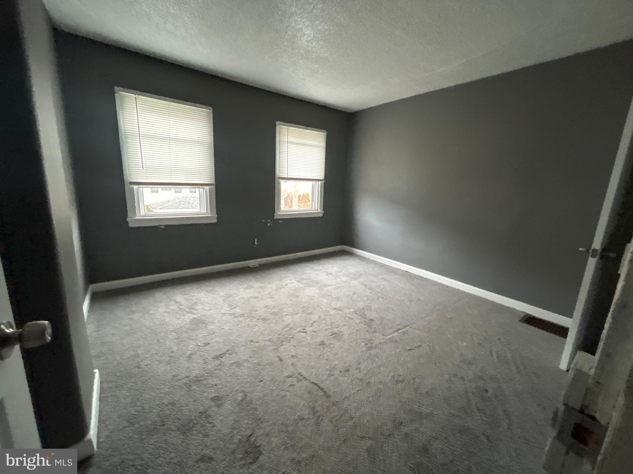 24 West Monroe Street Mount Holly, NJ 08060 - Photo 13 of 20 an empty room with windows
