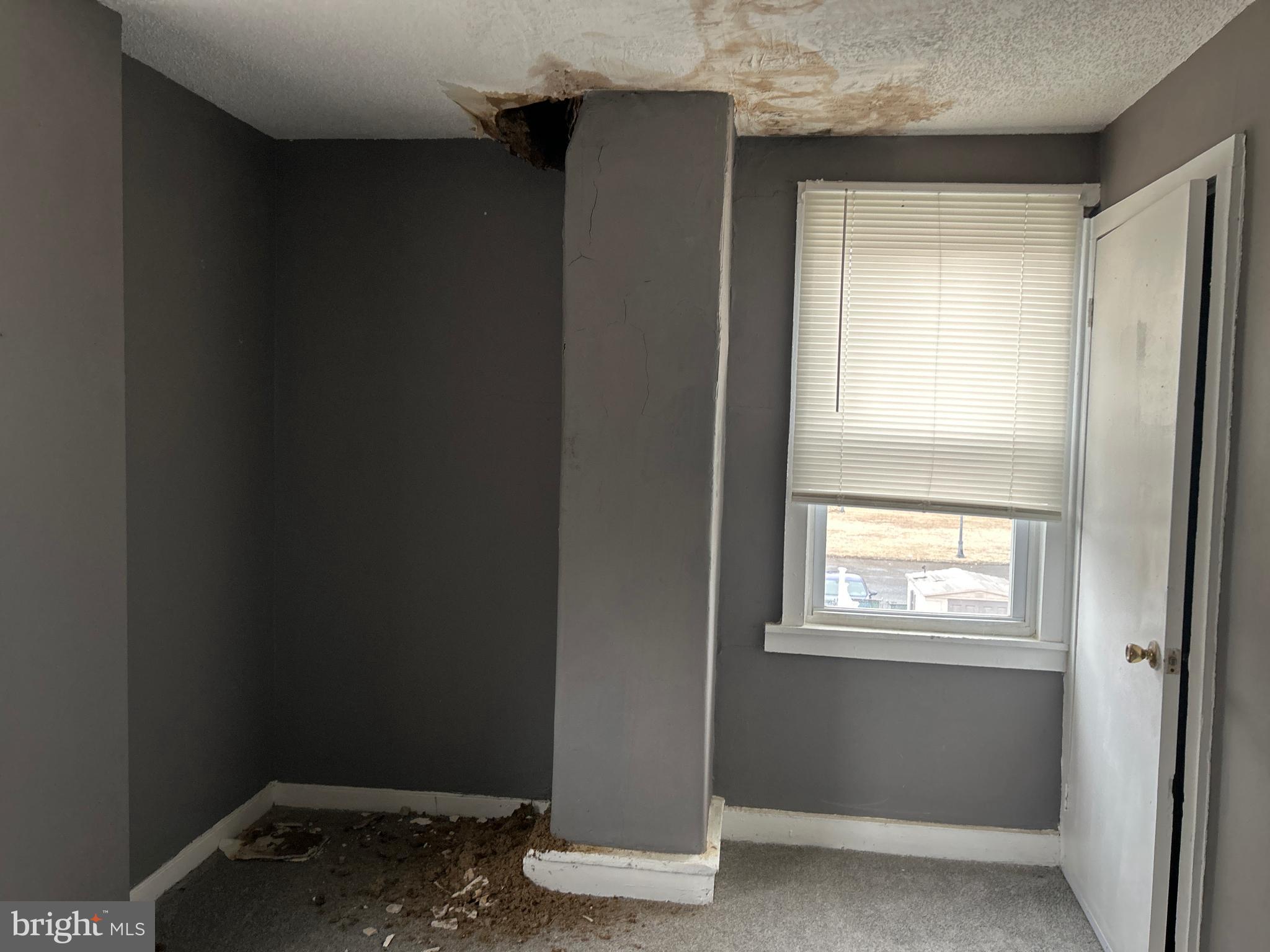 24 West Monroe Street Mount Holly, NJ 08060 - Photo 17 of 20 a view of an empty room with a window