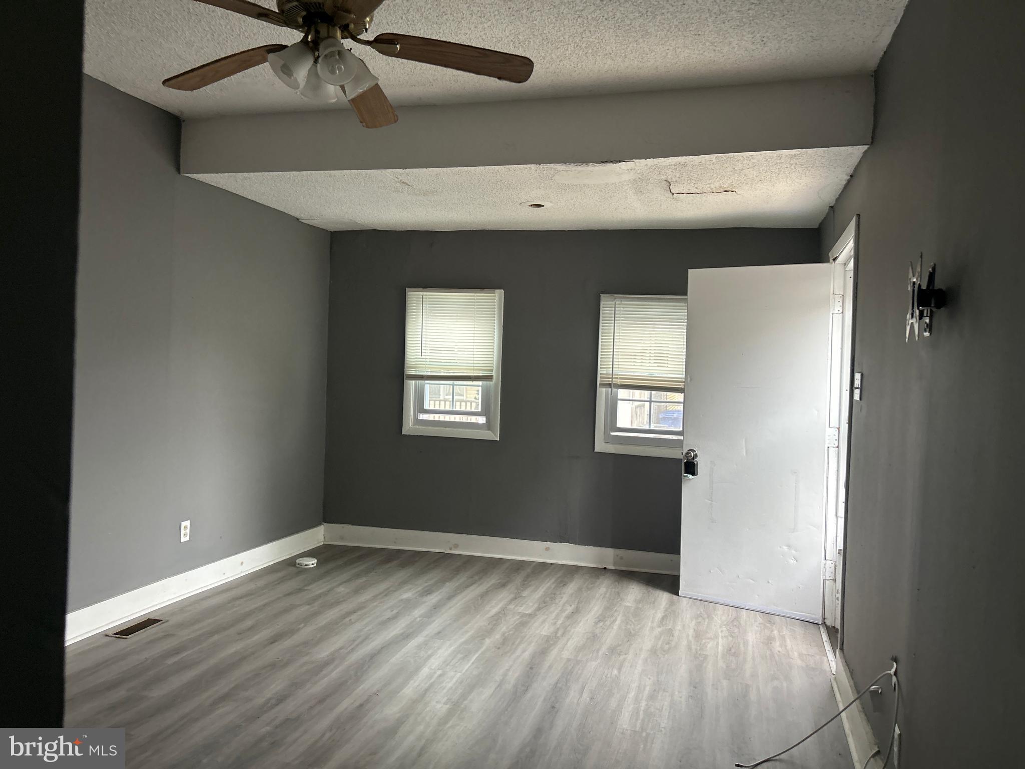 24 West Monroe Street Mount Holly, NJ 08060 - Photo 2 of 20 a view of an empty room with a window