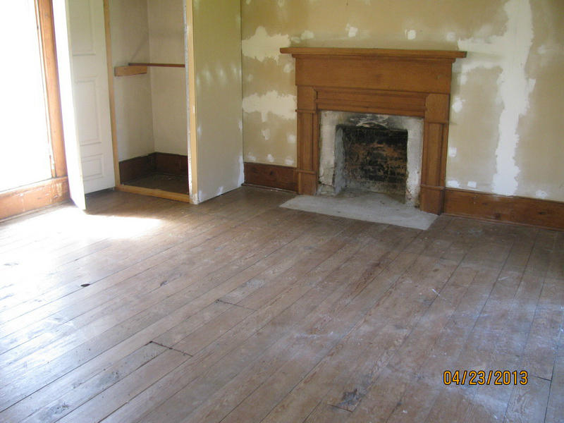 722 Mt Elbert Road Northwest Riner, VA 24149 - Photo 5 of 10 an empty room with a fireplace