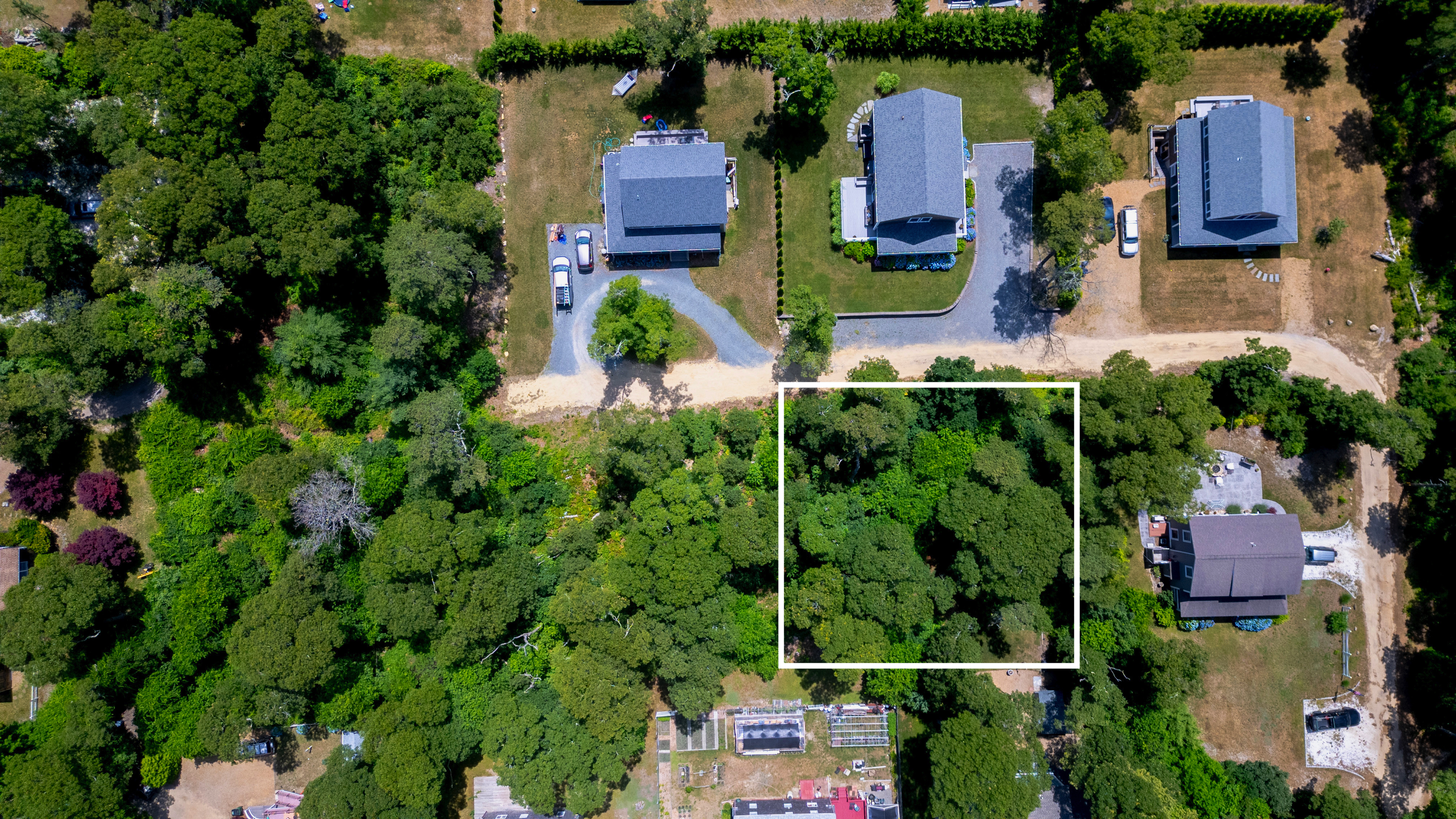 B California Avenue Oak Bluffs, MA 02557 - Photo 2 of 3 an aerial view of houses with yard