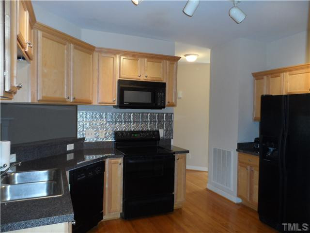 1056 Wheeler Pond Road, Unit LOT2 Creedmoor, NC 27522 - Photo 9 of 25 Open kitchen w/a serving bar & all appliances Kitchen