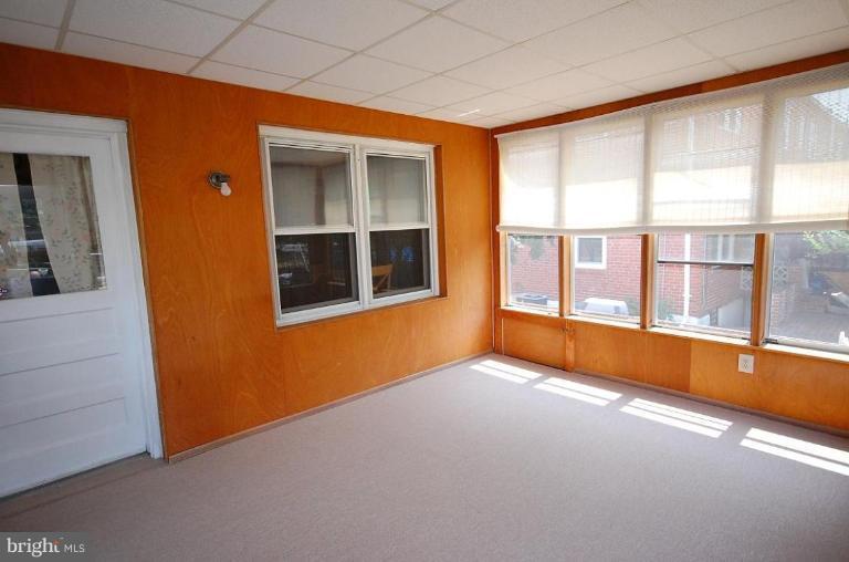 2141 Firethorn Road Middle River, MD 21220 - Photo 4 of 16 a view of an empty room with a window
