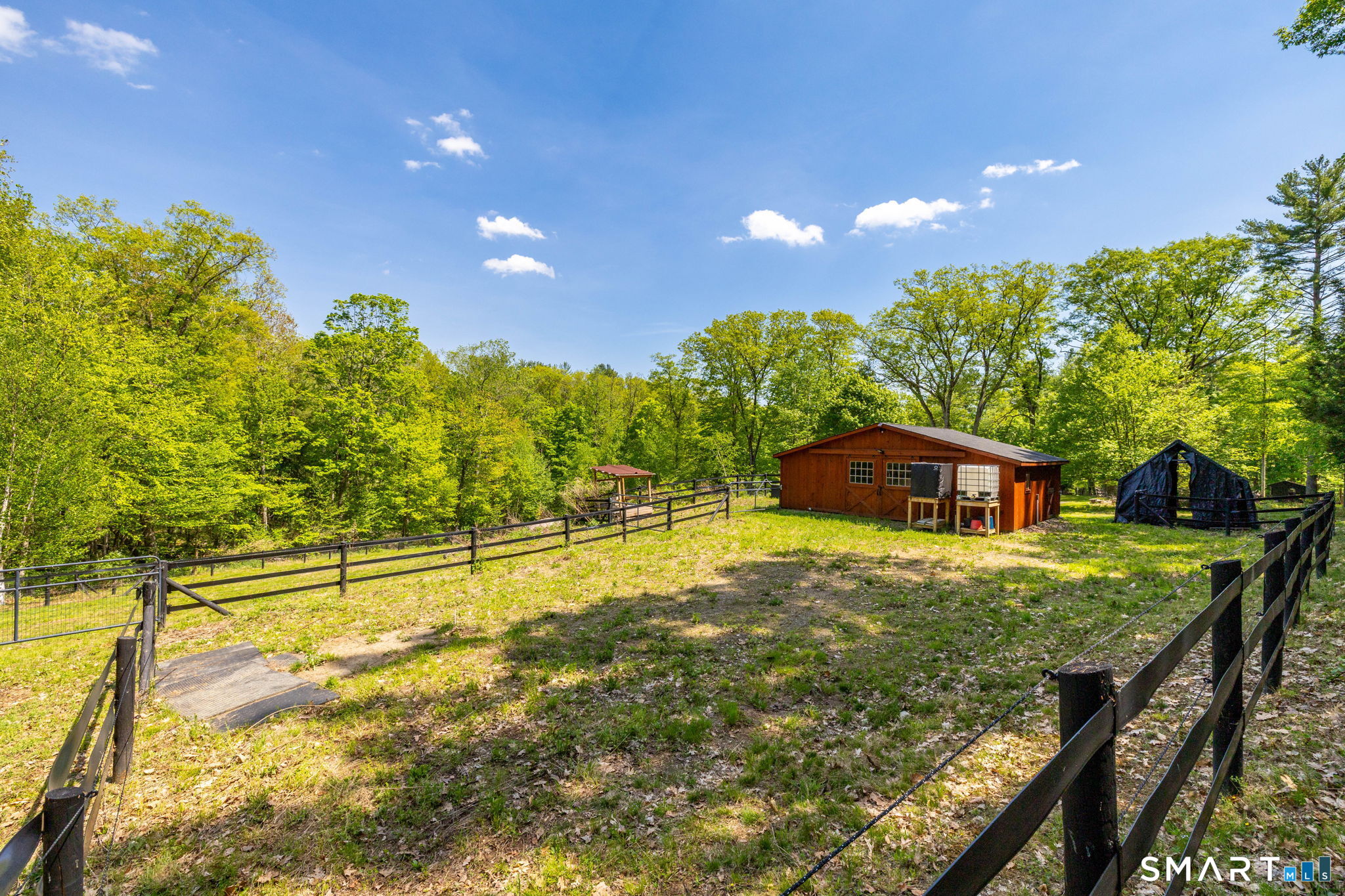 250 Center Hill Road Barkhamsted, CT 06063 - Photo 34 of 40 a view of a house with a backyard and a tree