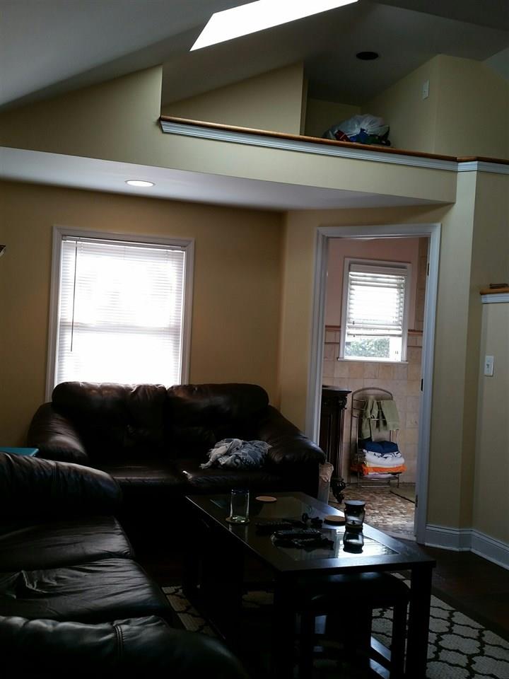 9 Wesley Road Ocean City, NJ 08226 - Photo 14 of 25 a living room with furniture and a window