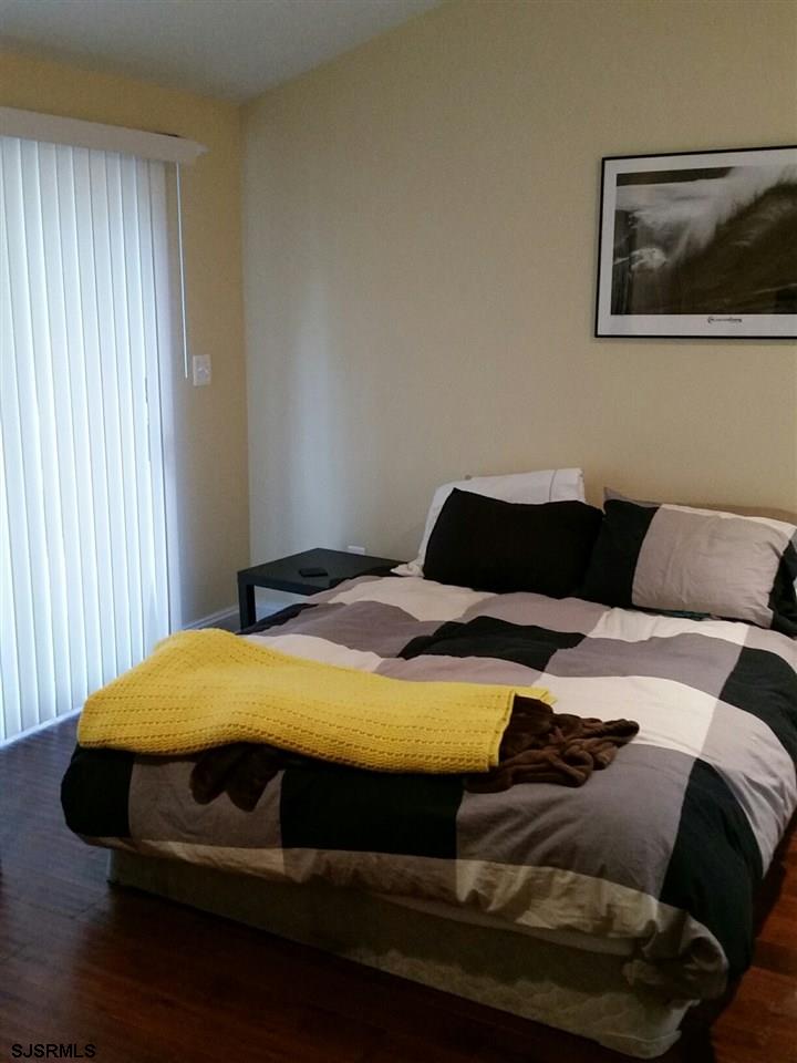 9 Wesley Road Ocean City, NJ 08226 - Photo 15 of 25 a bedroom with a bed and window