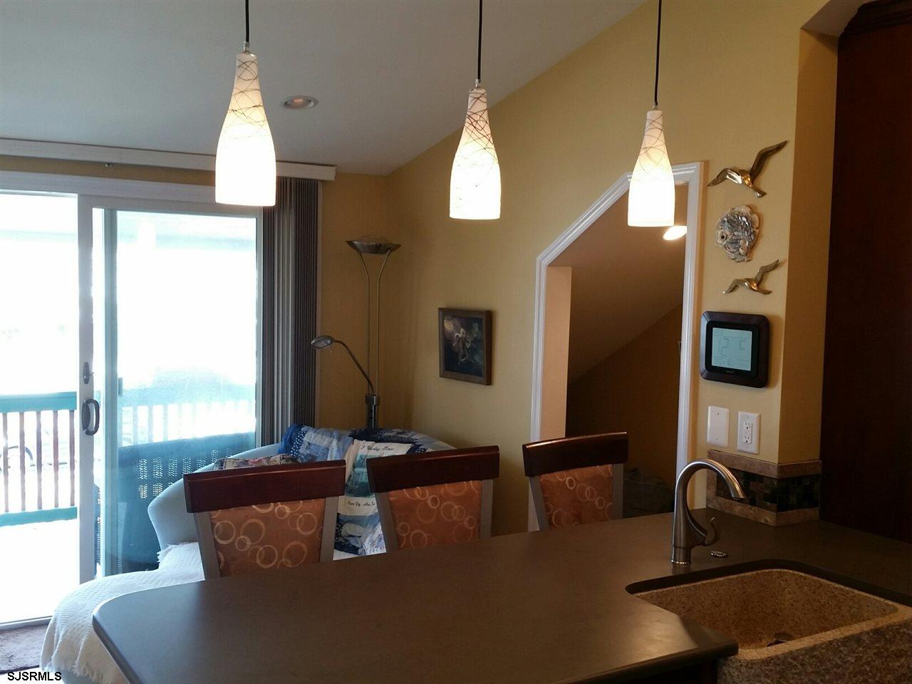 9 Wesley Road Ocean City, NJ 08226 - Photo 22 of 25 a living room with furniture and a window