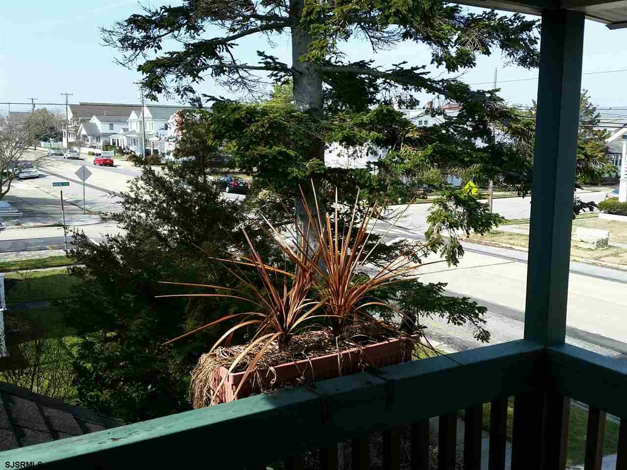 9 Wesley Road Ocean City, NJ 08226 - Photo 23 of 25 a view of a yard from a balcony