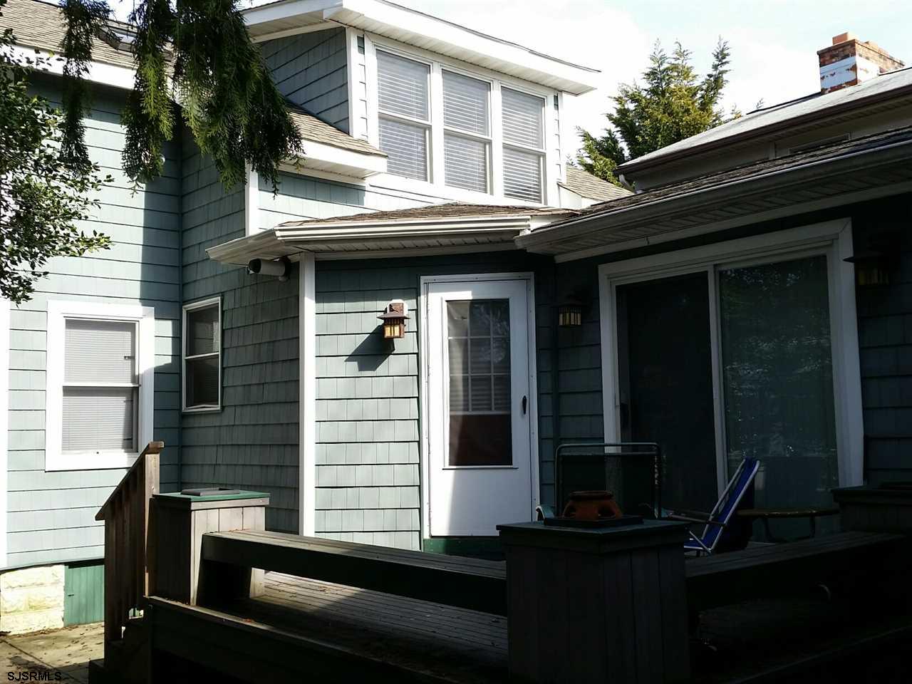 9 Wesley Road Ocean City, NJ 08226 - Photo 9 of 25 a view of a building with many windows