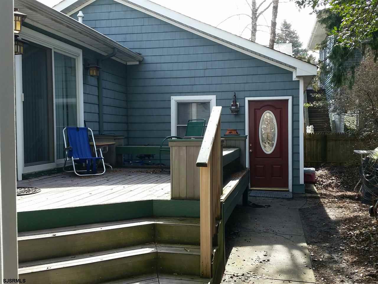 9 Wesley Road Ocean City, NJ 08226 - Photo 10 of 25 a view of a entryway door of the house with outdoor seating