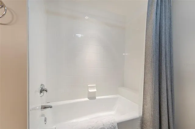 a bathroom with a bathtub