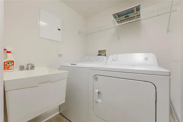 a utility room with dryer and washer